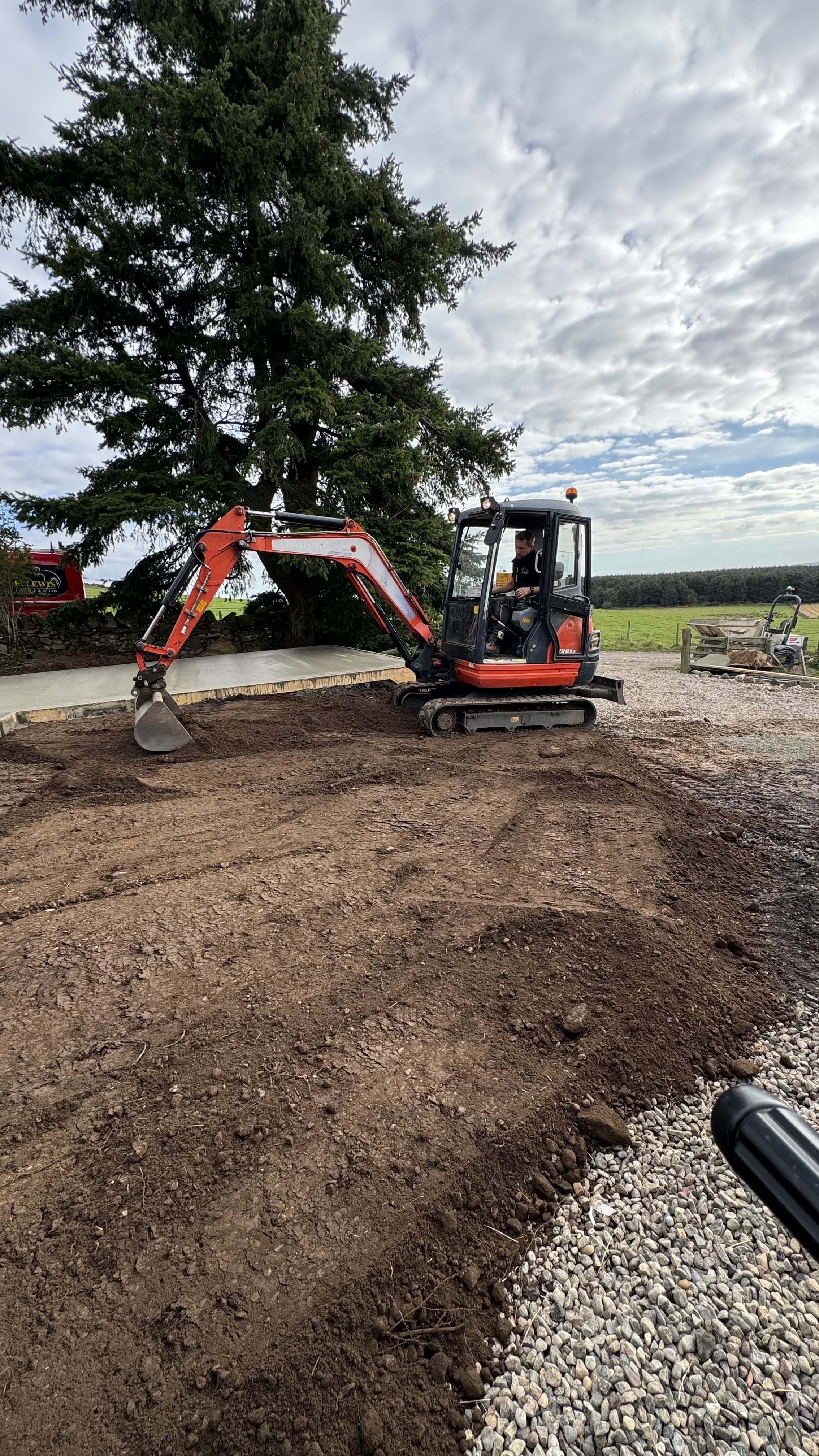 Site preparation work with excavator for equestrian construction project